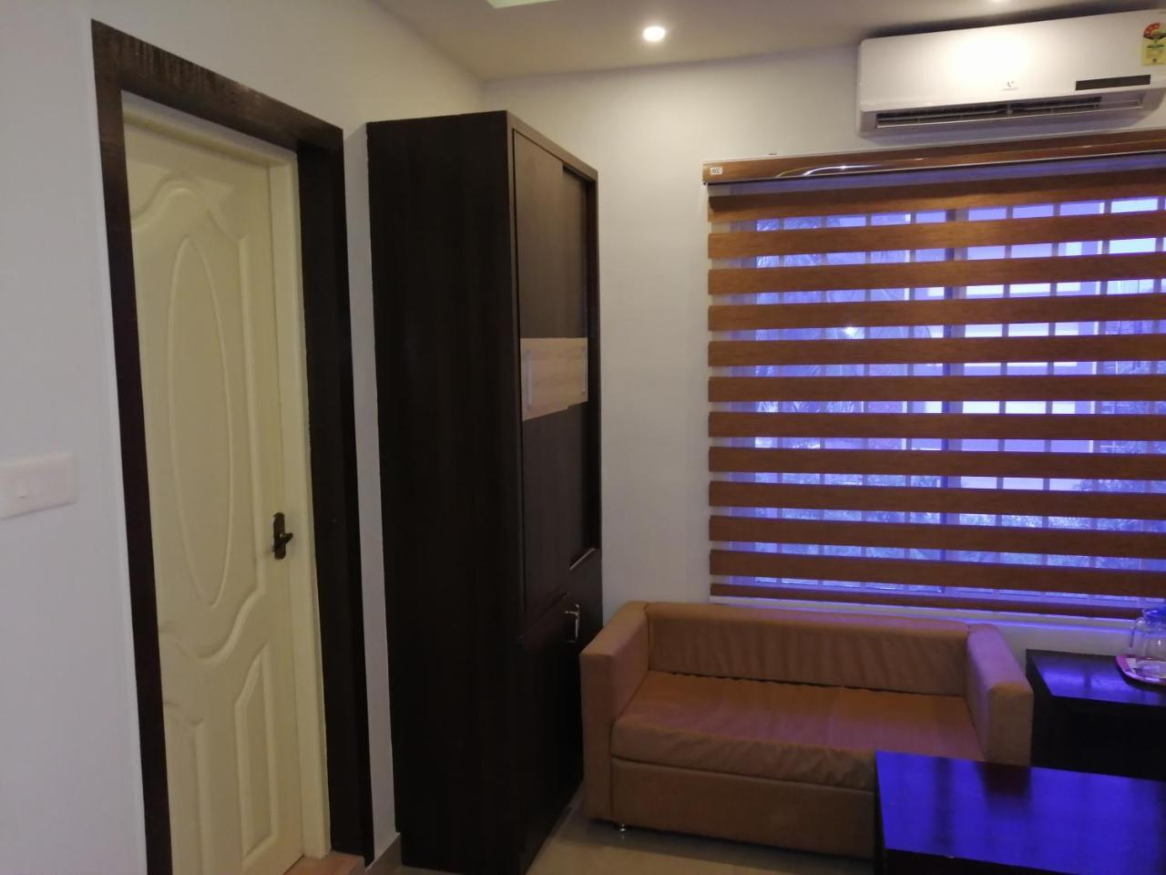 The Orchid Suites Kollam Extérieur photo